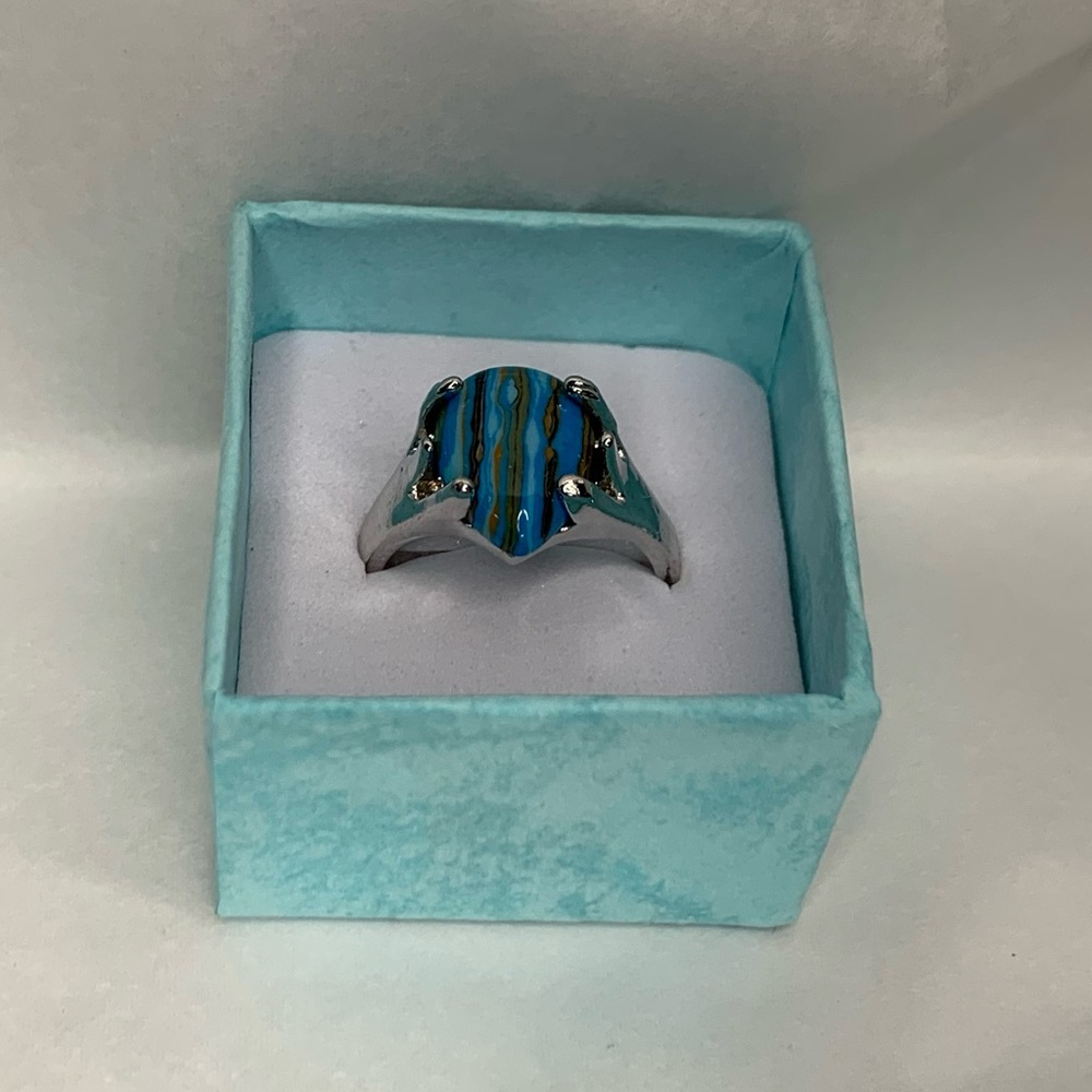 Ring with blue stone